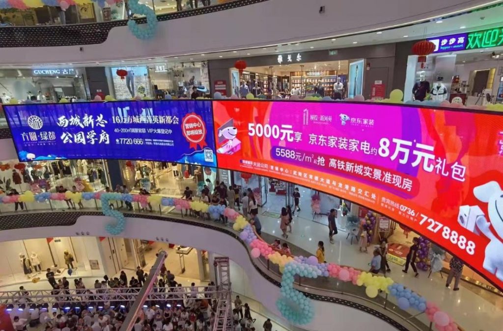 Guojia LED-P3.9 Transparent LED Display at a shopping mall